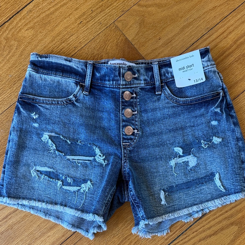 abercrombie kids distressed blue denim mid rise shorts with button-front